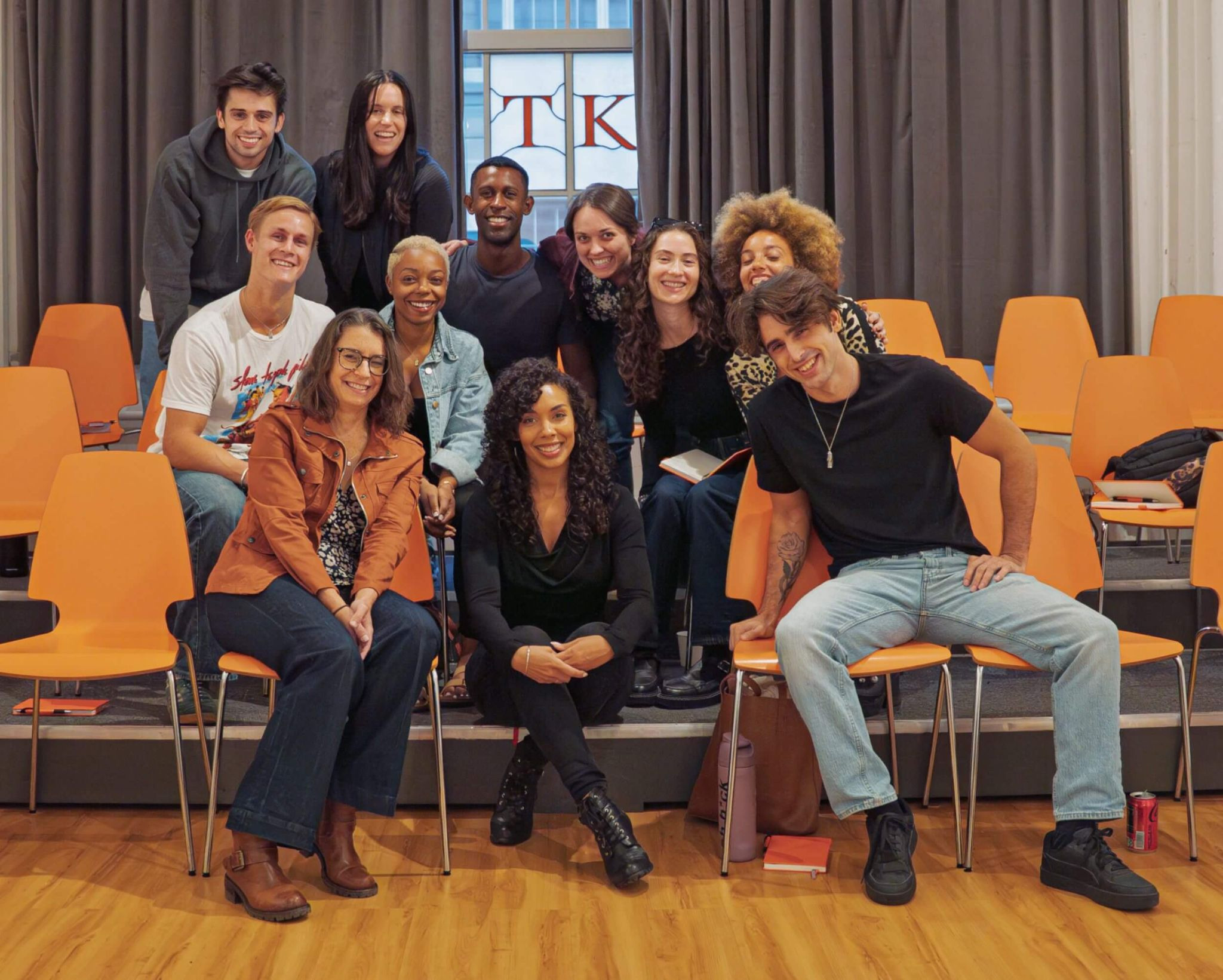 Celestine Rae speaking with conservatory graduate Christopher Lewis Dawkins during a candid discussion that reflects the TKS Conservatory Experience and Meisner-based actor development.