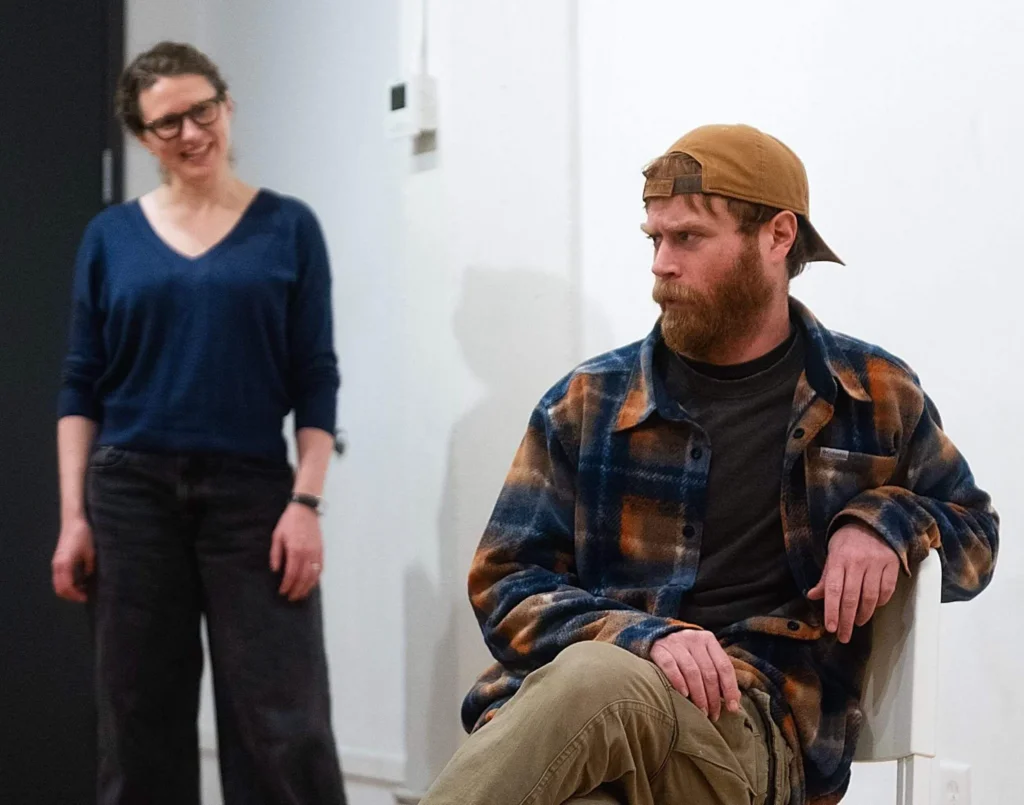 Two actors performing a scene together during an acting training exercise at Terry Knickerbocker Studio in Brooklyn.