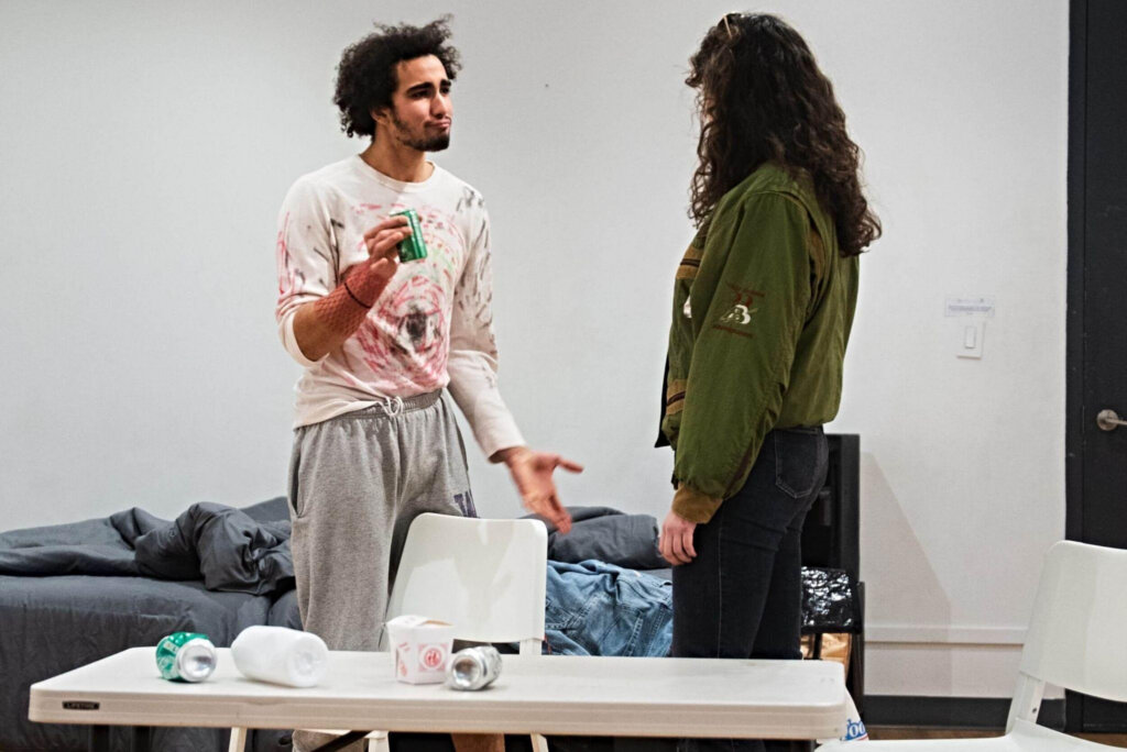 Two acting students engaged in scene work, practicing listening and truthful response during actor training at TKS.